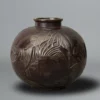 Rare cast bronze vase depicting fish. The design of this vase originally created by René Lalique in 1921 (Vase Poissons) by the Shobido Company