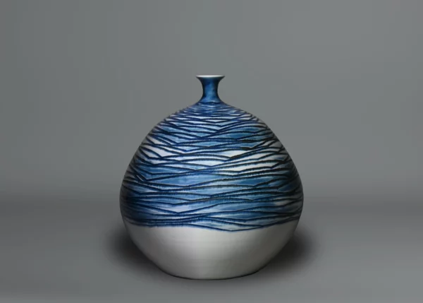 Blue and white porcelain vase by Fujii Shumei