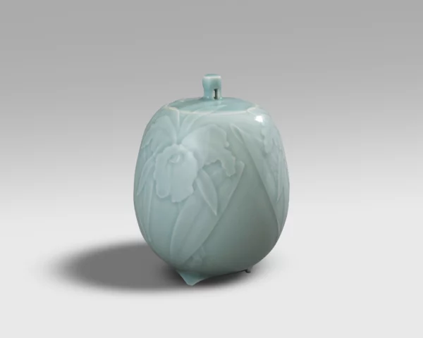 Celadon porcelain incense burner with orchids by Ito Kei