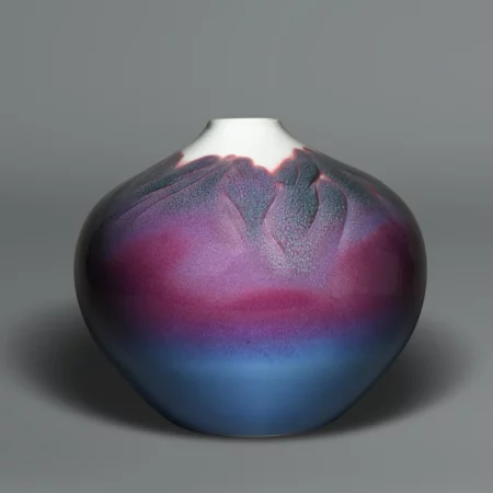 Arita porcelain vase depicting misty mountains in shades of pink, purple and blue glaze