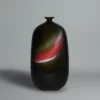 Sadamatsu Zenji, tall ceramic vase in black and red cinnabar enamel